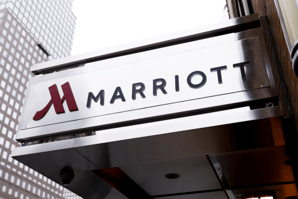 hotel logo on city sidewalk at the entrance